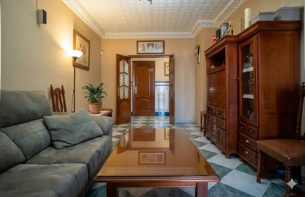 Sala de estar de Casa adosada en venta en Alcalá del Río con Aire acondicionado, Calefacción y Amueblado