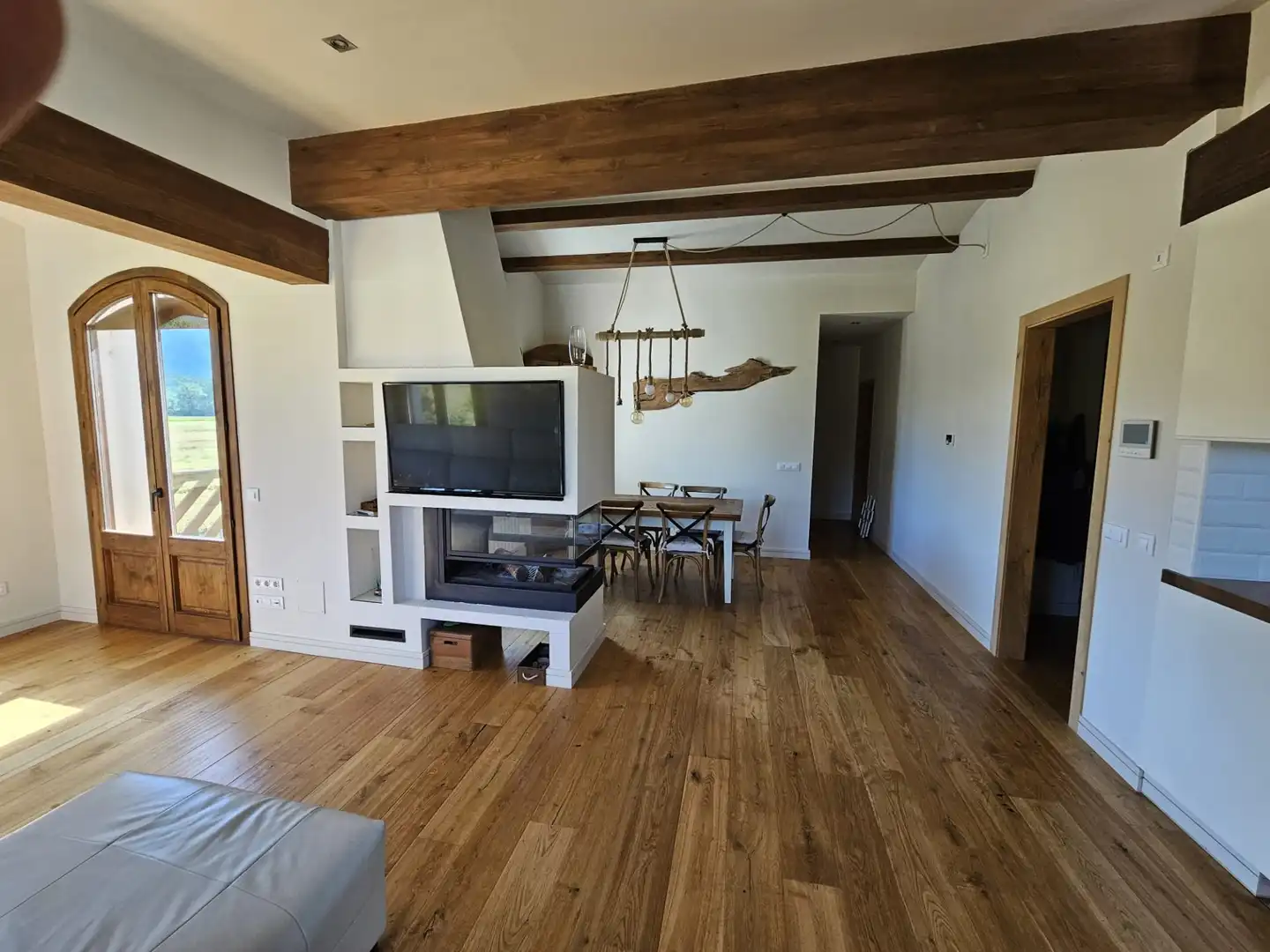 Sala d'estar de Finca rústica en venda en La Vall d'en Bas amb Calefacció, Terrassa i Piscina
