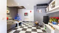 Sala d'estar de Casa adosada en venda en Becerril de la Sierra amb Terrassa
