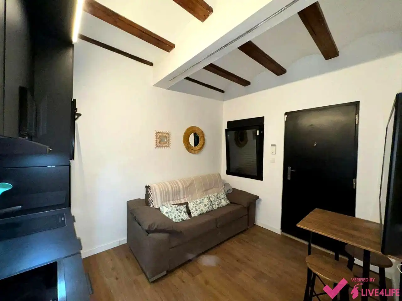 Sala d'estar de Pis de lloguer en Valencia amb Aire condicionat i Moblat