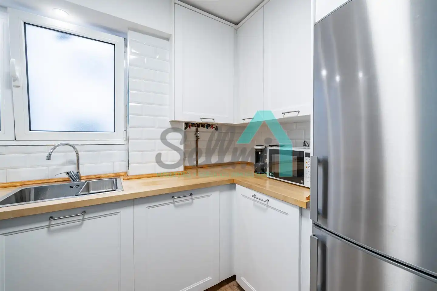 Kitchen of Flat for rent in Gijón   with Heating, Terrace and Furnished