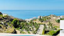 Vista exterior de Casa o xalet en venda en Torrox amb Aire condicionat, Jardí privat i Traster