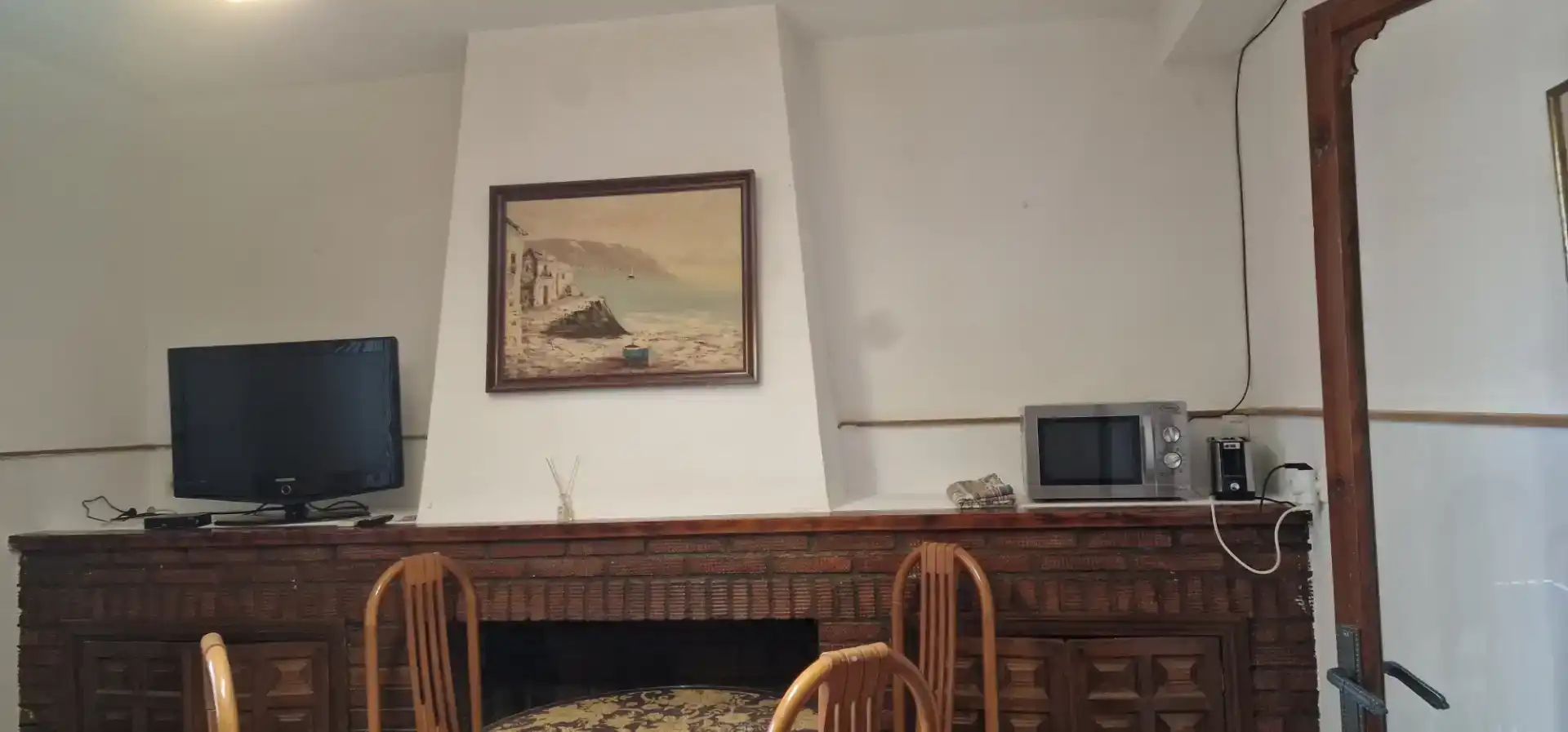 Sala d'estar de Casa adosada en venda en Herrera del Duque amb Aire condicionat, Traster i Moblat