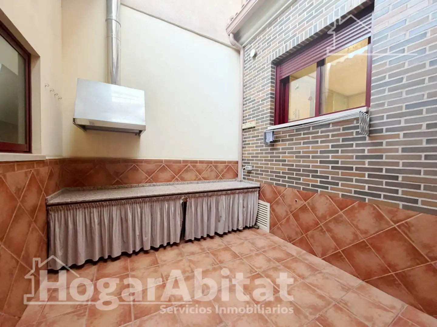 Cuina de Casa adosada en venda en Sagunto / Sagunt amb Aire condicionat, Jardí privat i Terrassa