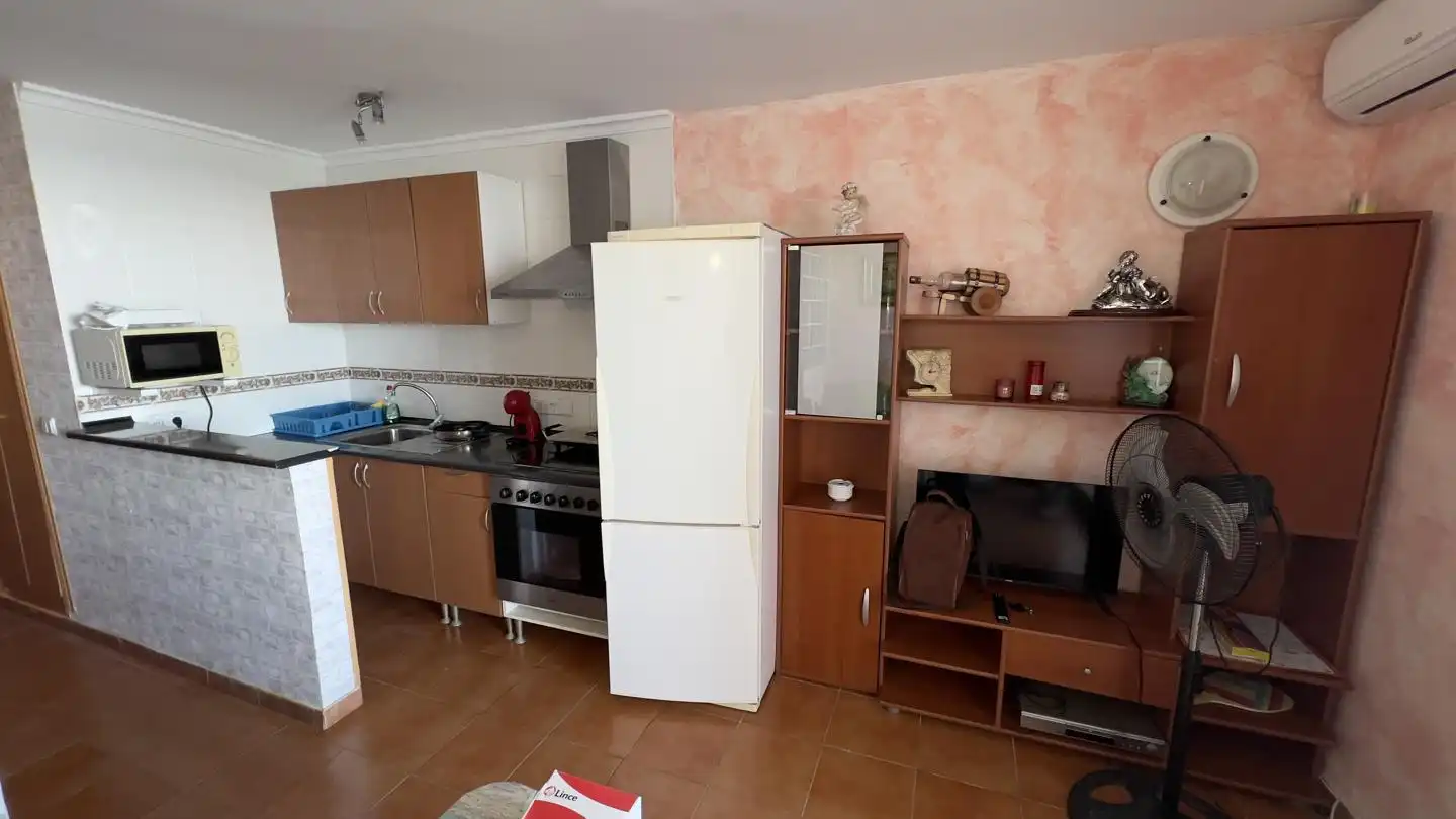 Kitchen of Flat for sale in Alcalà de Xivert  with Air Conditioner, Private garden and Terrace