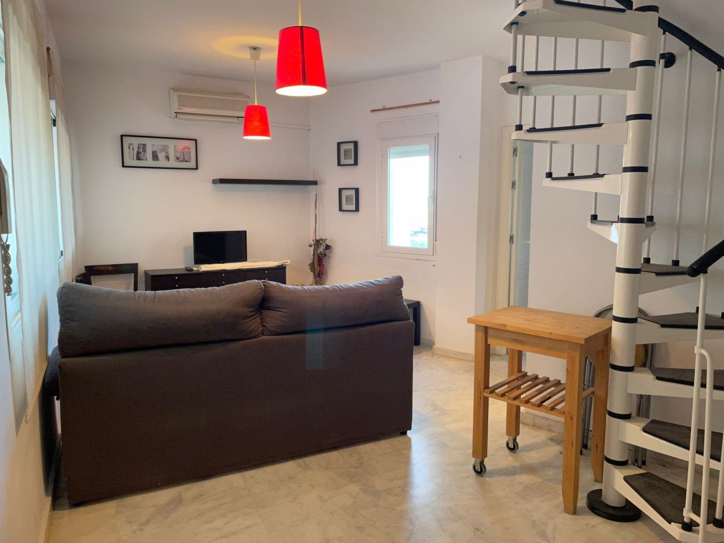 Living room of Duplex for sale in Sanlúcar la Mayor  with Air Conditioner, Terrace and Swimming Pool