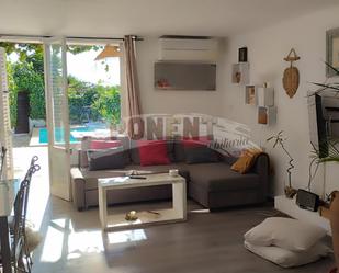 Living room of Single-family semi-detached for sale in Santa Eulària des Riu  with Air Conditioner, Terrace and Swimming Pool