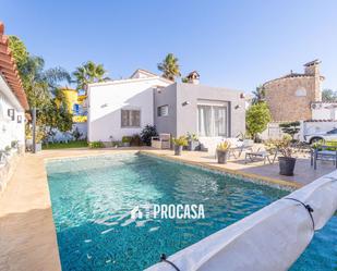 Exterior view of House or chalet for sale in Empuriabrava  with Air Conditioner, Heating and Storage room