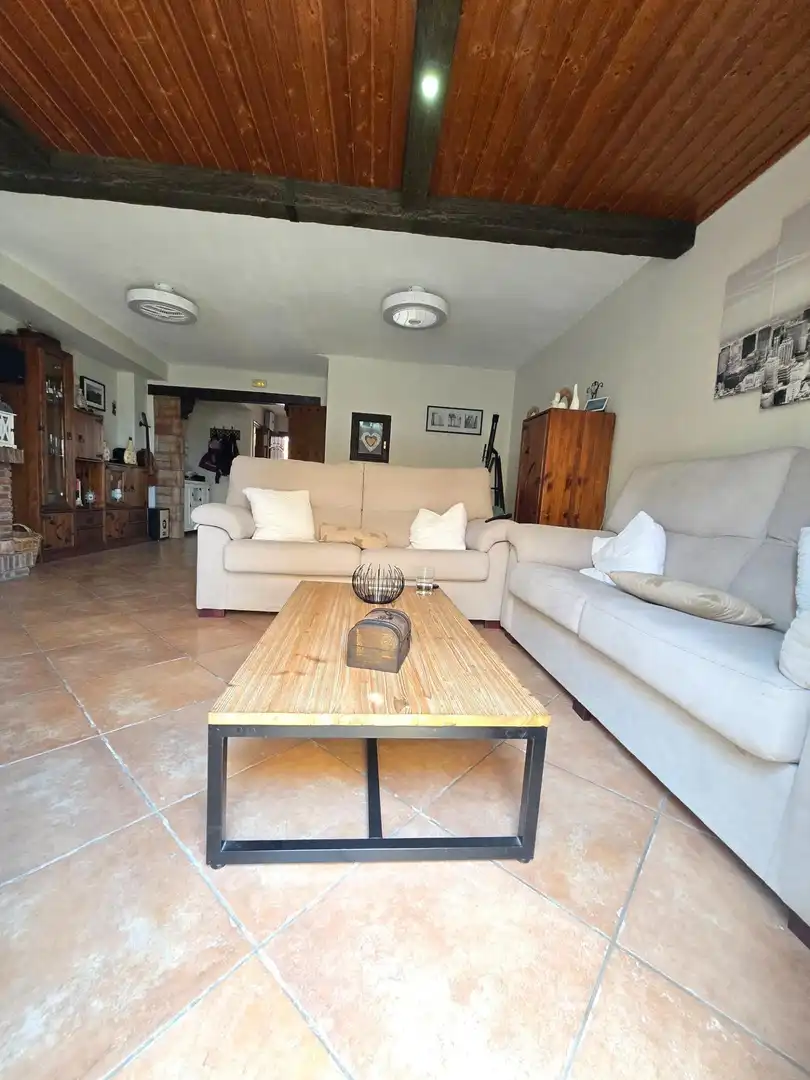 Sala d'estar de Casa adosada en venda en Alhaurín de la Torre amb Aire condicionat, Terrassa i Piscina comunitària