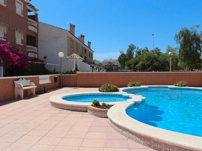 Swimming pool of Single-family semi-detached for sale in Santa Pola  with Air Conditioner, Heating and Private garden