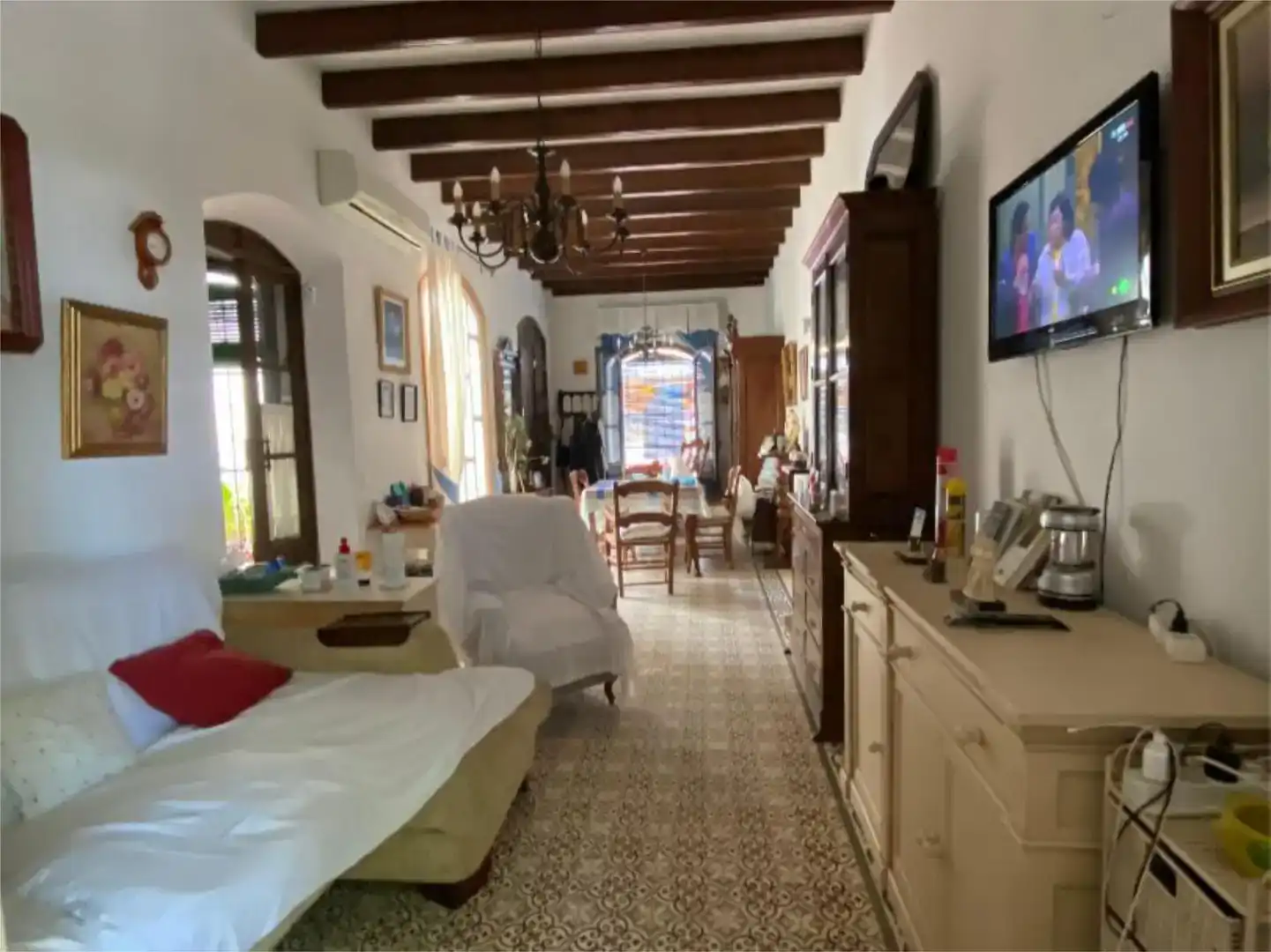 Sala d'estar de Casa adosada en venda en Bollullos de la Mitación amb Aire condicionat