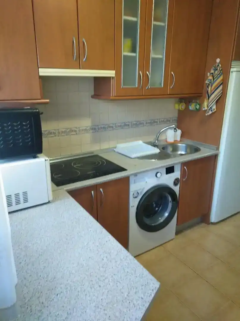 Cuina de Planta baixa de lloguer en Torremolinos amb Aire condicionat, Moblat i Forn