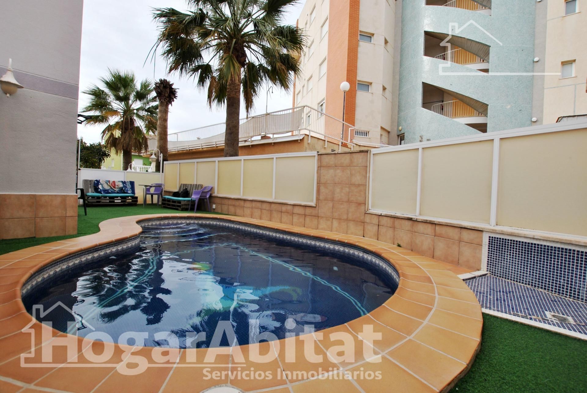 Swimming pool of Single-family semi-detached for sale in Oliva  with Air Conditioner, Private garden and Terrace