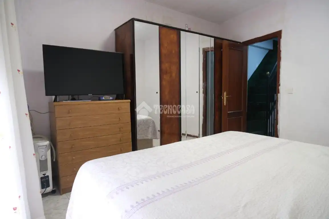 Dormitori de Casa adosada en venda en Sevilla