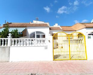 Exterior view of Single-family semi-detached for sale in Torrevieja  with Terrace, Furnished and Community pool