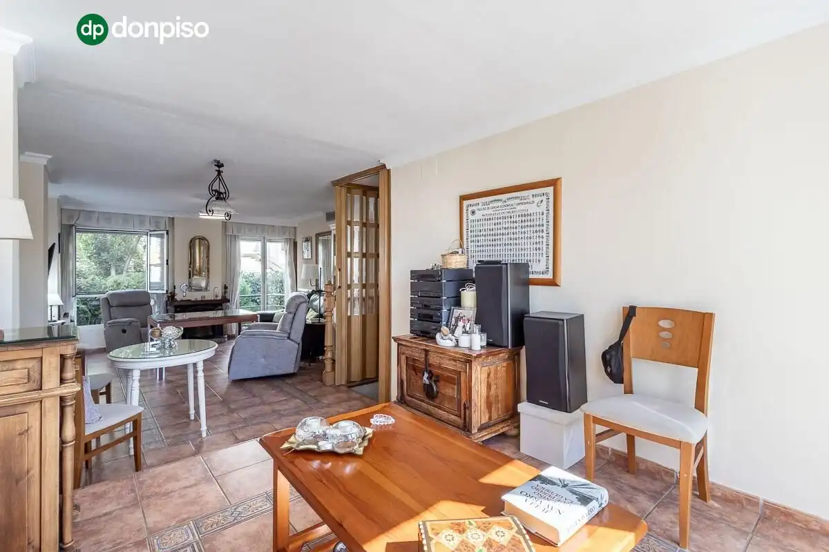 Sala de estar de Casa adosada en venta en Genil