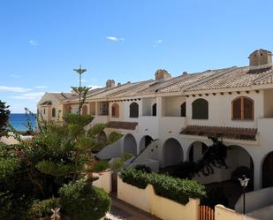 Exterior view of Single-family semi-detached for sale in La Manga del Mar Menor  with Air Conditioner, Heating and Private garden