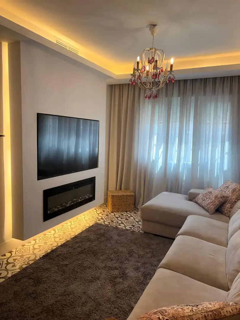 Sala de estar de Casa adosada en venta en Utrera con Aire acondicionado, Trastero y Balcón