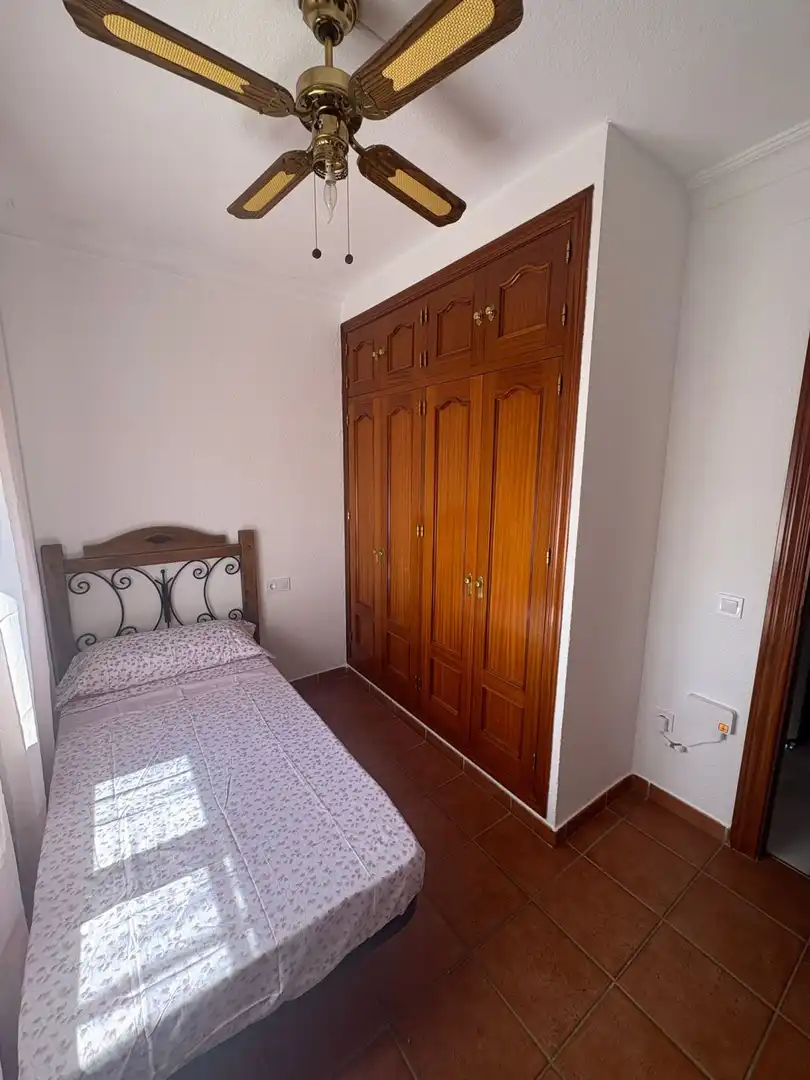 Dormitori de Casa o xalet de lloguer en Aljaraque amb Terrassa i Moblat