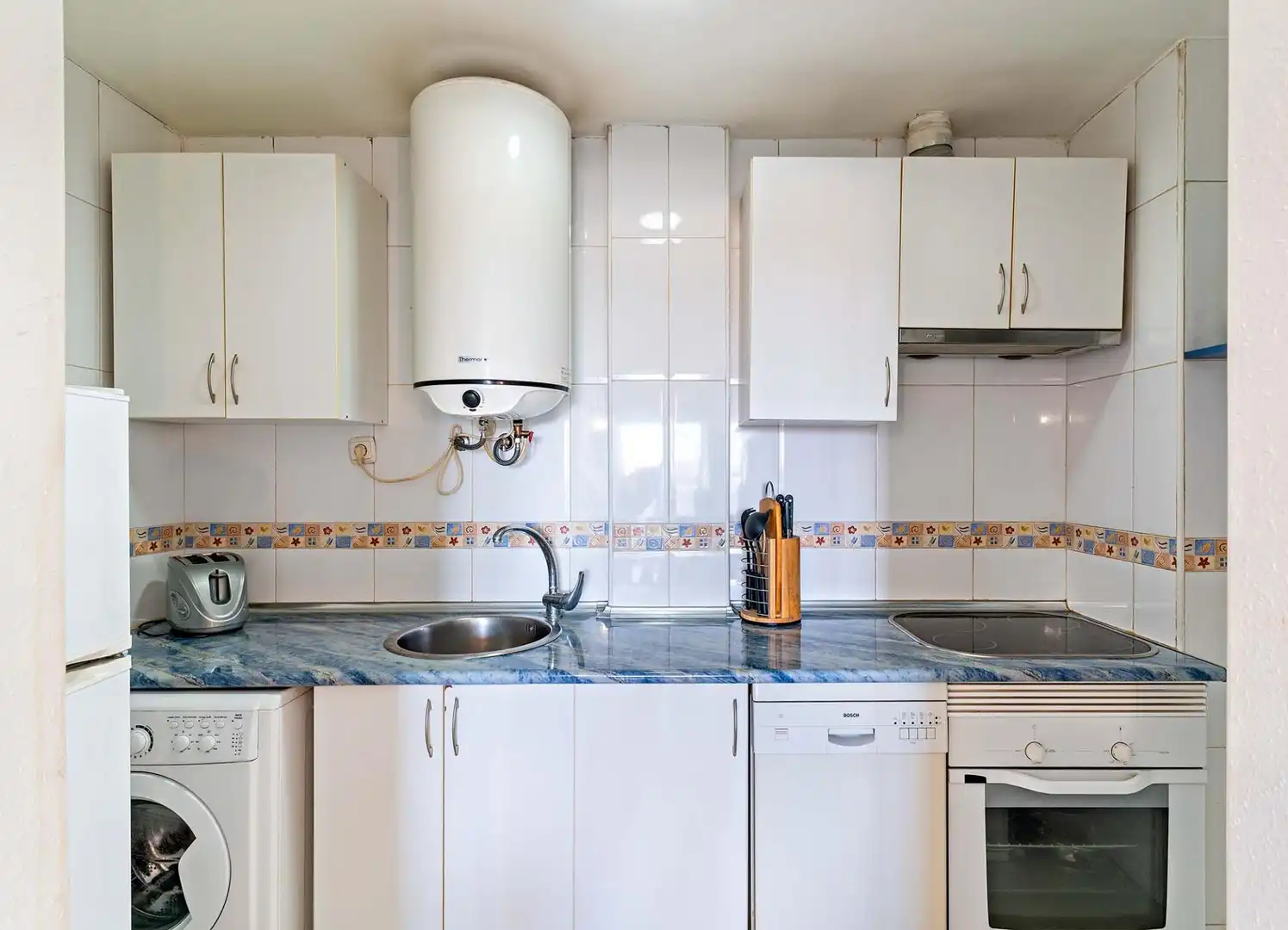 Kitchen of Flat for sale in Roquetas de Mar  with Air Conditioner, Heating and Furnished