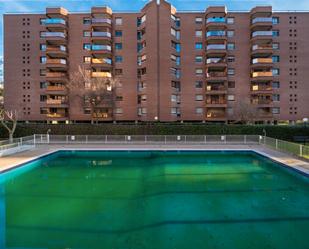 Swimming pool of Attic for sale in  Madrid Capital  with Air Conditioner, Heating and Terrace