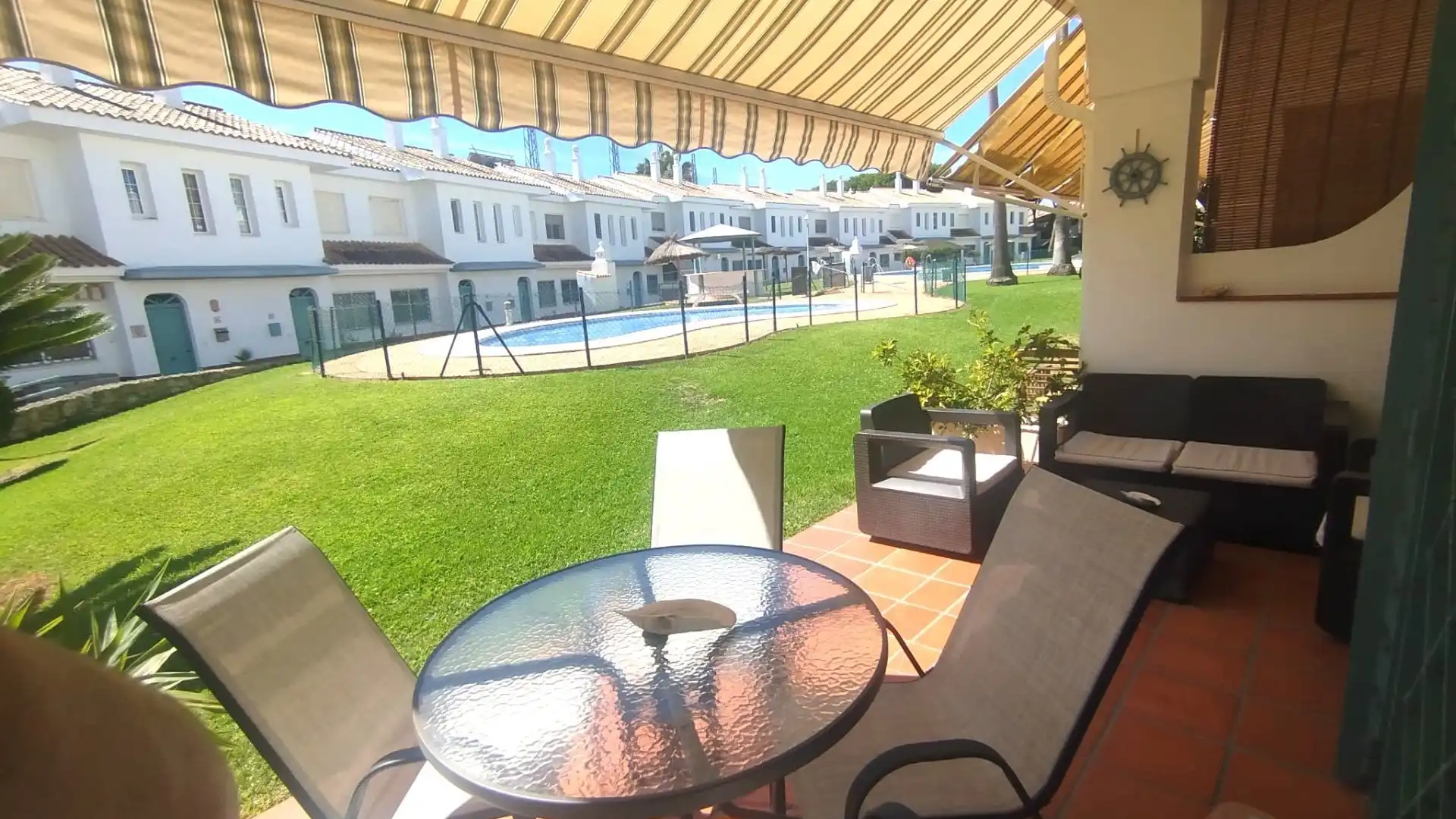 Jardín de Casa adosada de alquiler en El Portil con Aire acondicionado y Piscina comunitaria