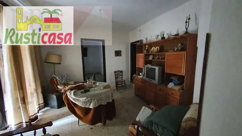 Sala de estar de Casa o chalet en venta en Baños de la Encina con Jardín privado