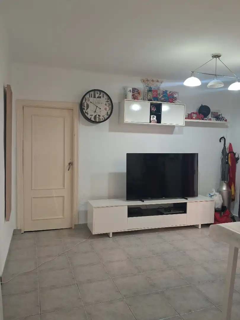 Living room of Flat for sale in San Juan de Aznalfarache  with Air Conditioner, Parquet flooring and Balcony