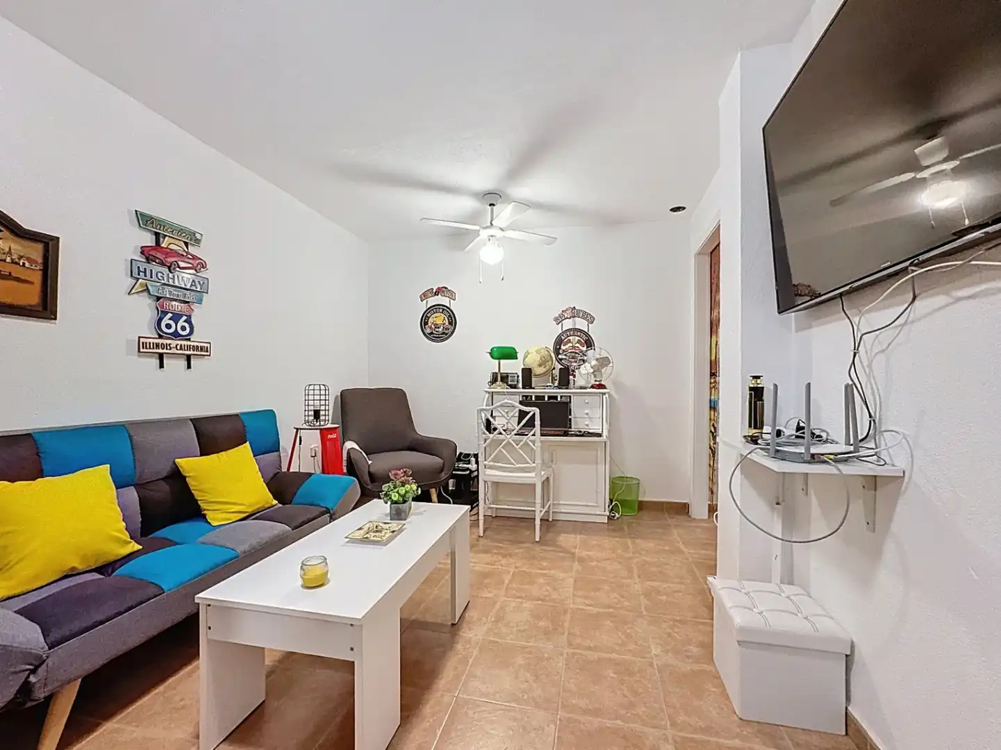 Sala d'estar de Casa adosada en venda en L'Alfàs del Pi amb Aire condicionat, Jardí privat i Terrassa