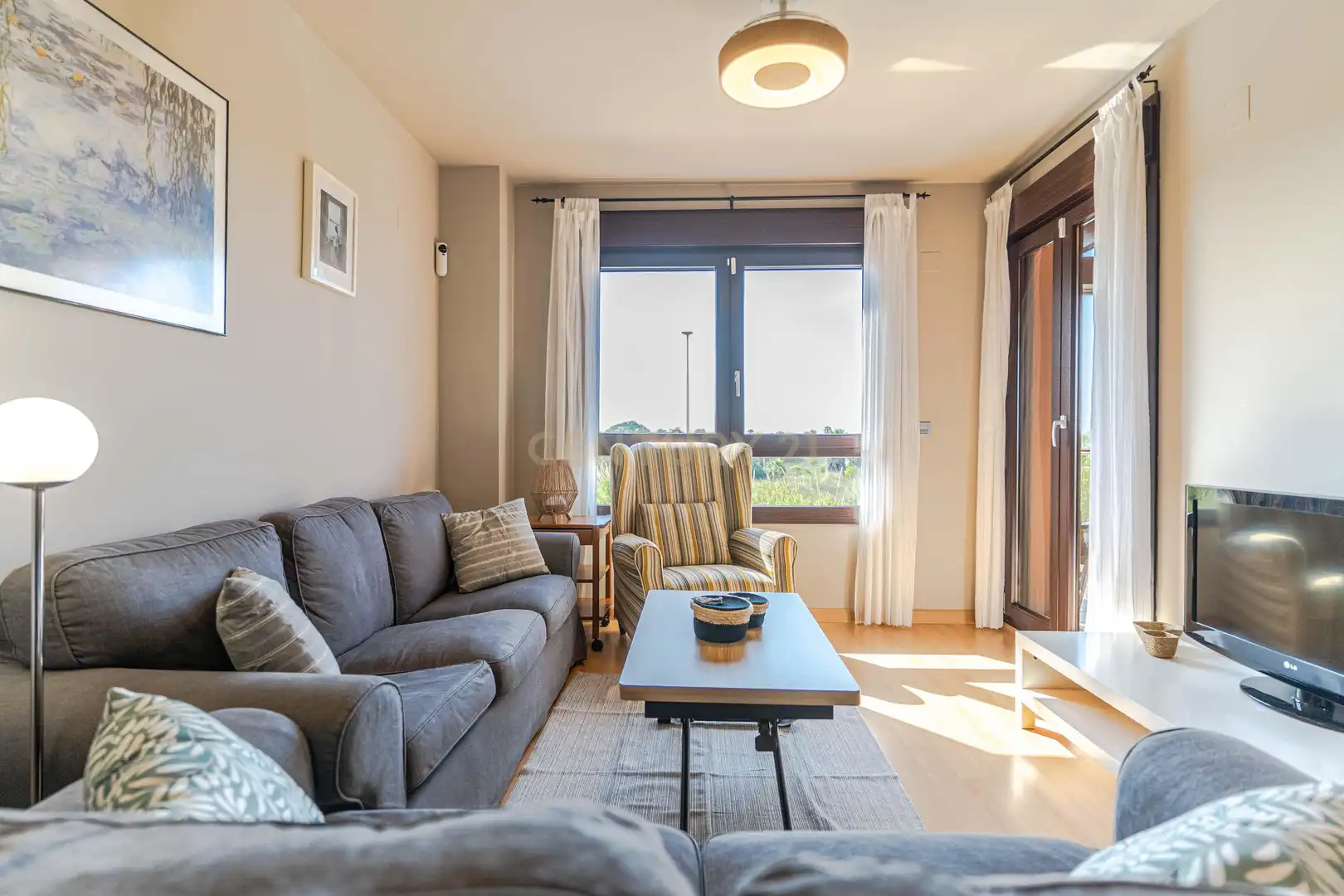 Living room of Flat for sale in Motril  with Air Conditioner, Private garden and Swimming Pool