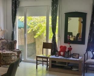 Sala d'estar de Casa adosada en venda en La Muela amb Terrassa