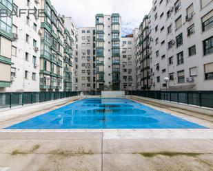 Swimming pool of Flat for sale in  Madrid Capital  with Terrace, Storage room and Swimming Pool