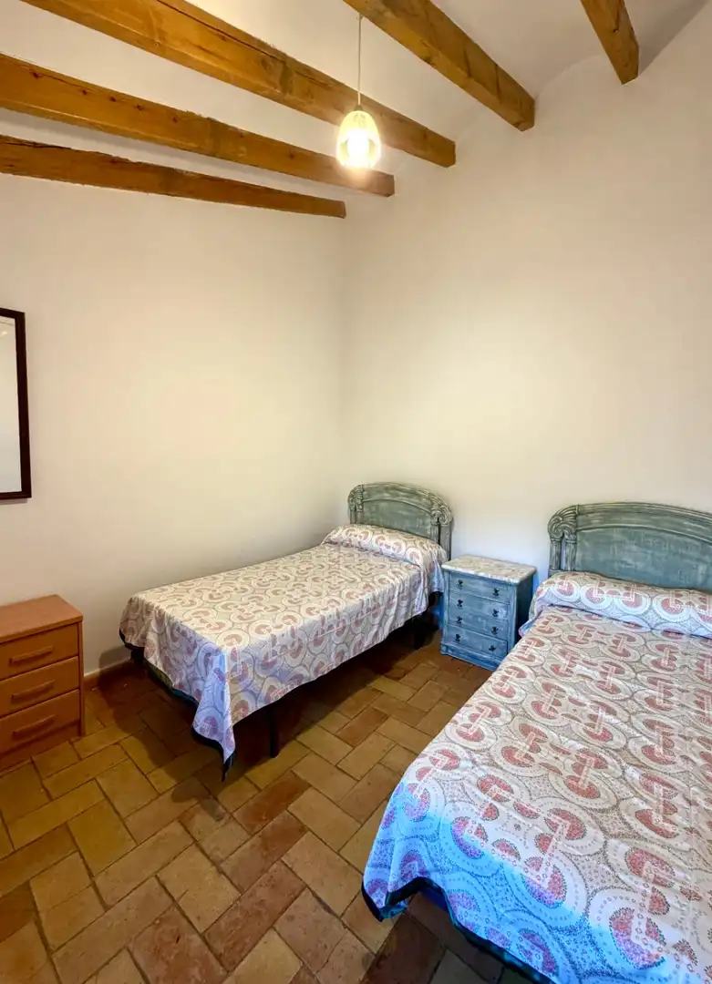 Dormitori de Finca rústica de lloguer en Canyelles amb Aire condicionat, Calefacció i Jardí privat