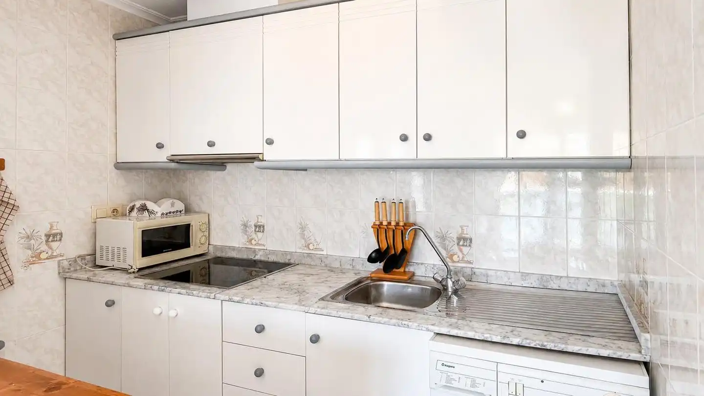 Kitchen of Flat for sale in Santa Pola  with Terrace, Swimming Pool and Furnished