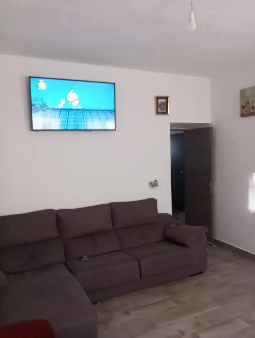 Sala d'estar de Casa adosada en venda en Cuevas del Campo