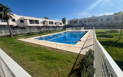 Swimming pool of Single-family semi-detached for sale in Dos Hermanas  with Heating and Swimming Pool