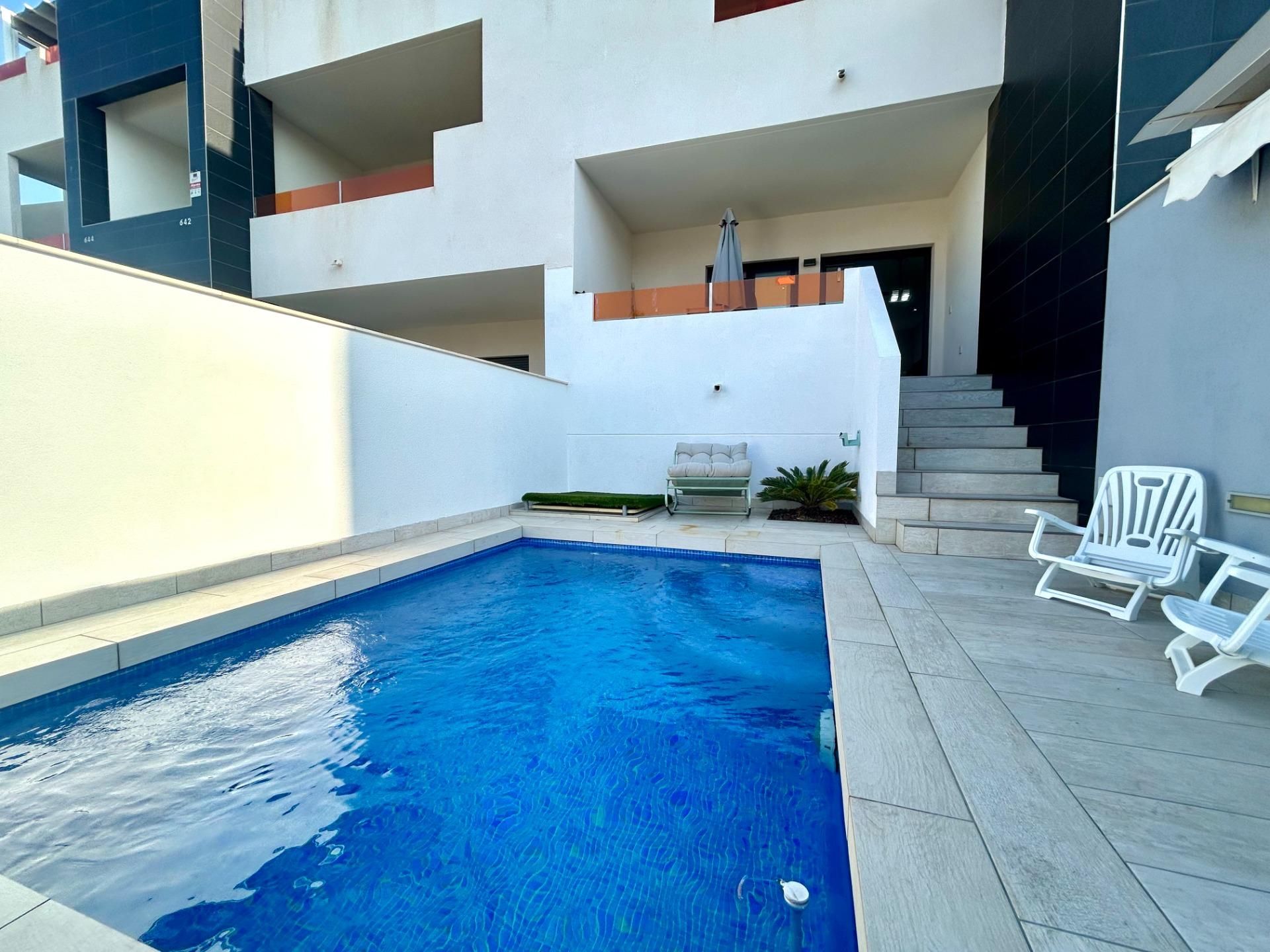 Swimming pool of Flat for sale in Orihuela  with Air Conditioner, Terrace and Swimming Pool