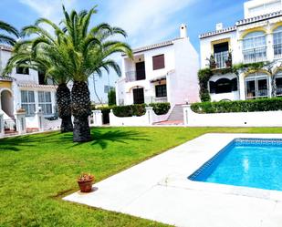 Jardí de Dúplex de lloguer en Torrevieja amb Aire condicionat, Terrassa i Piscina