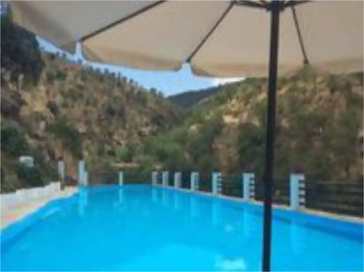 Piscina de Finca rústica en venda en Laroya amb Jardí privat, Piscina i Moblat