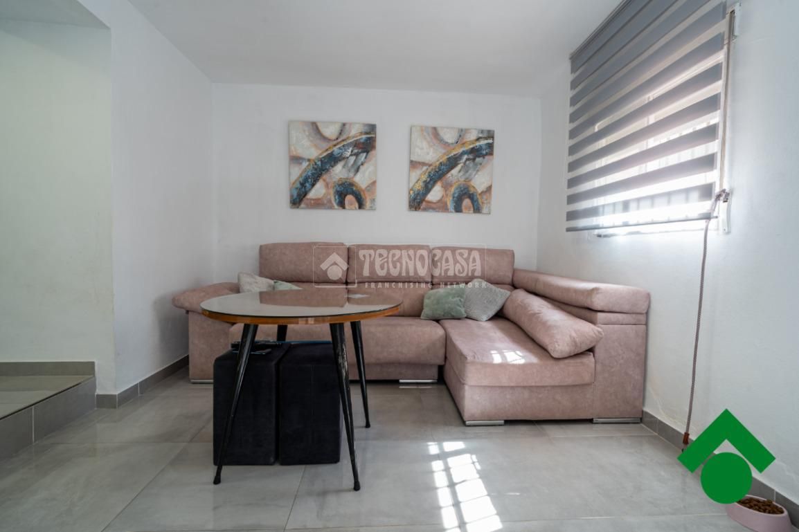 Sala d'estar de Casa adosada en venda en Pinos Puente