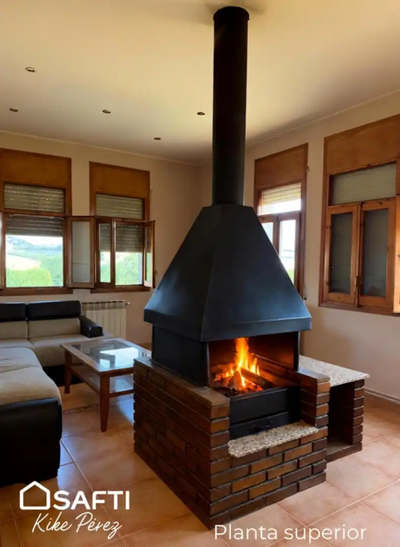 Sala de estar de Casa o chalet en venta en Alguaire con Calefacción, Terraza y Amueblado