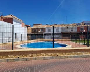 Swimming pool of Single-family semi-detached for sale in Dos Hermanas  with Air Conditioner, Heating and Terrace