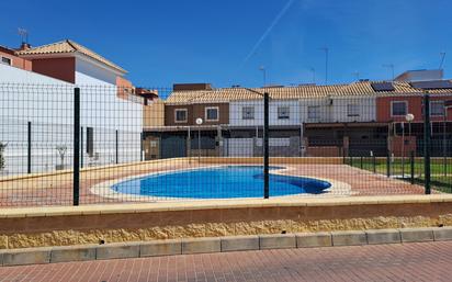 Swimming pool of Single-family semi-detached for sale in Dos Hermanas  with Air Conditioner, Heating and Terrace