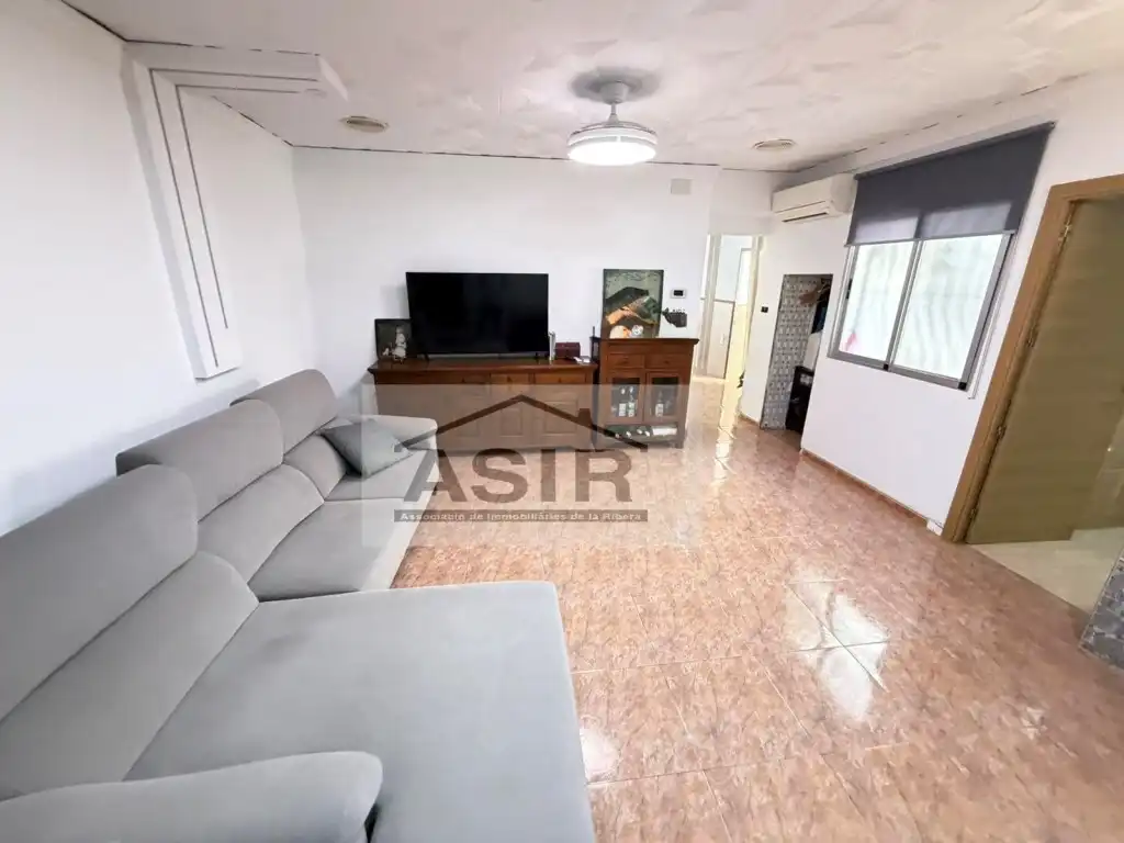Sala d'estar de Casa o xalet de lloguer en Alzira amb Aire condicionat i Terrassa
