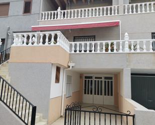 Exterior view of Single-family semi-detached for sale in Jacarilla  with Air Conditioner, Terrace and Furnished