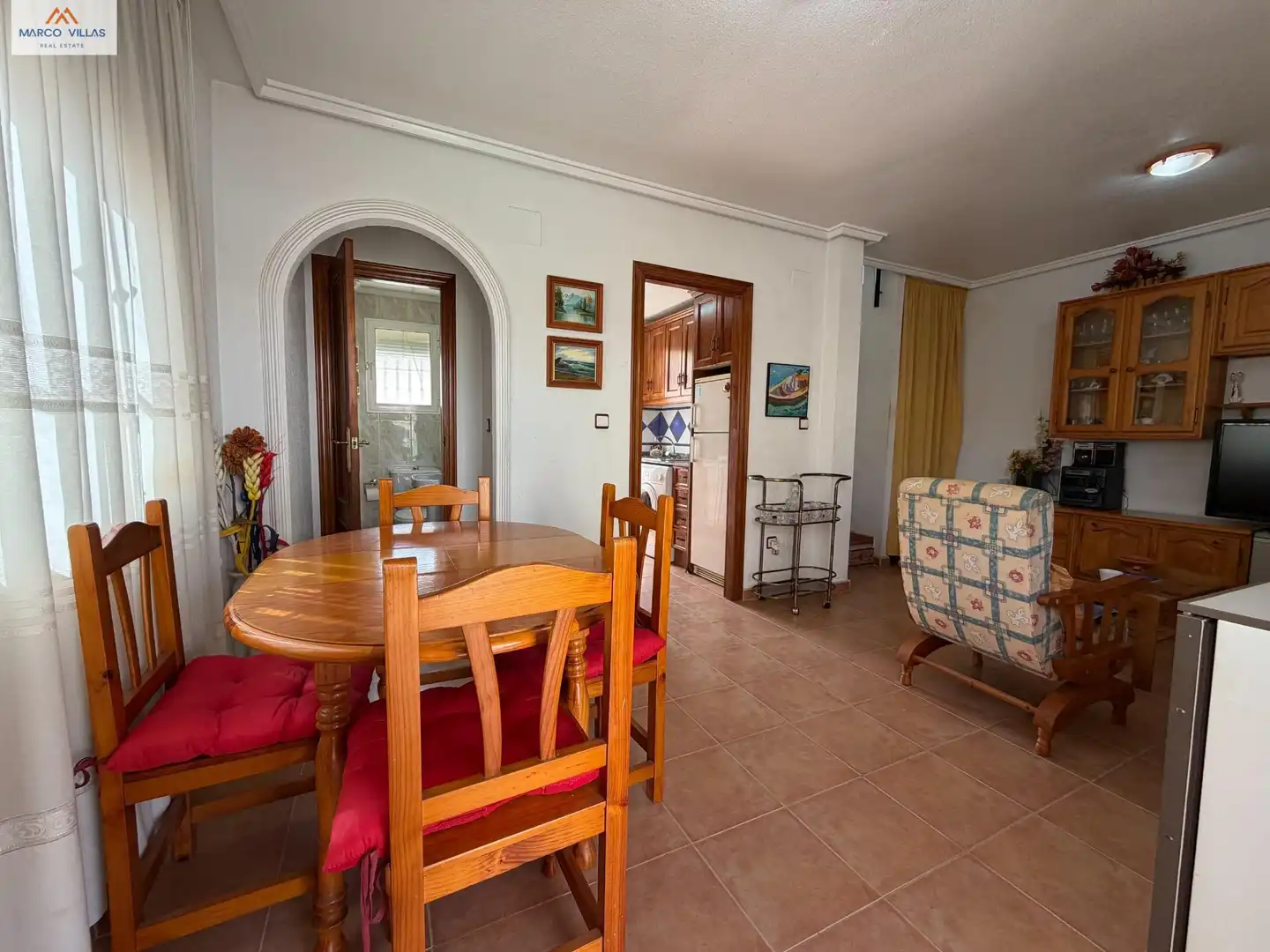 Sala d'estar de Casa adosada en venda en Guardamar del Segura amb Jardí privat, Terrassa i Moblat