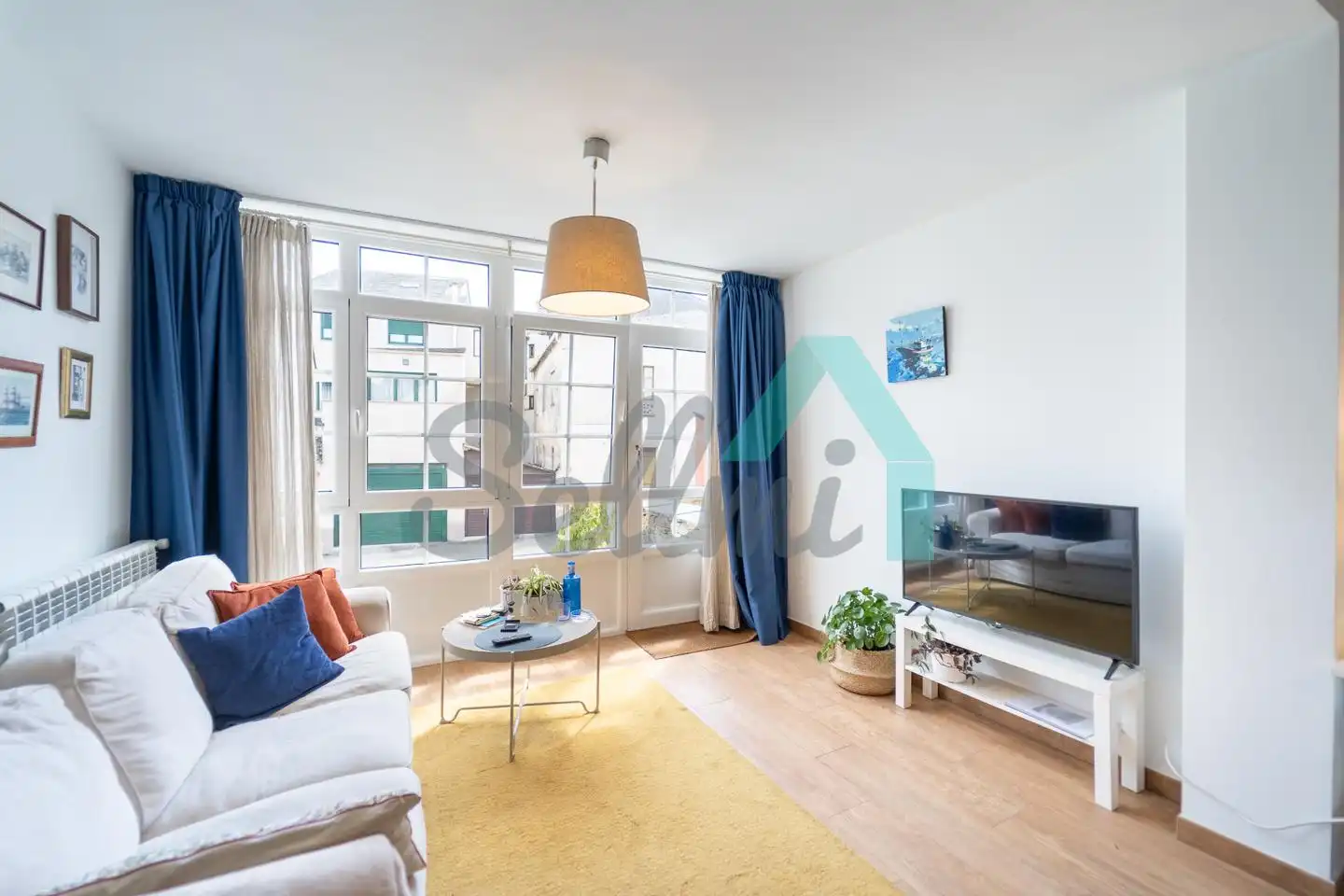 Sala de estar de Casa adosada en venta en Ribadeo con Calefacción, Jardín privado y Terraza