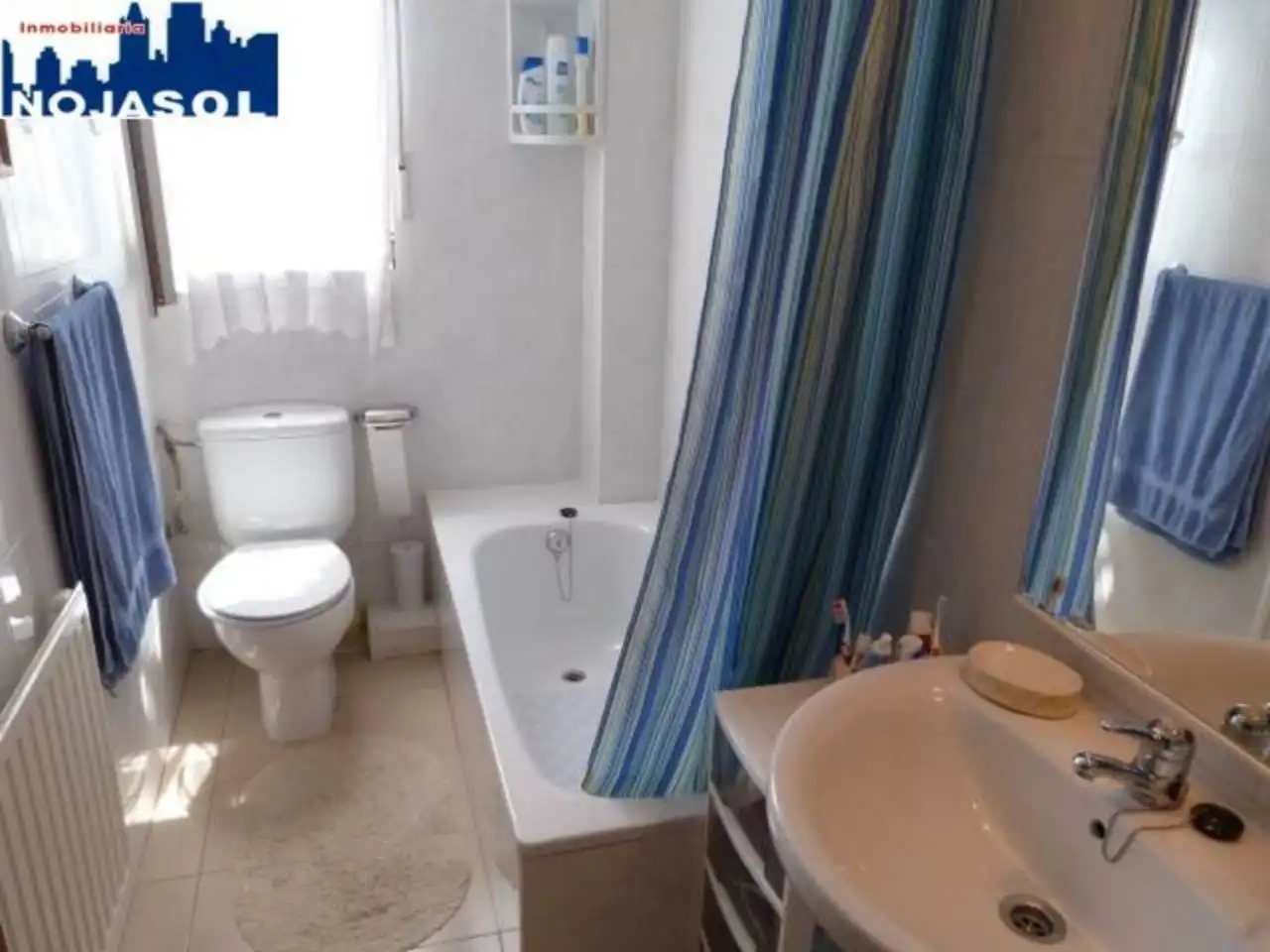 Bany de Apartament de lloguer en Arnuero amb Calefacció, Jardí privat i Terrassa