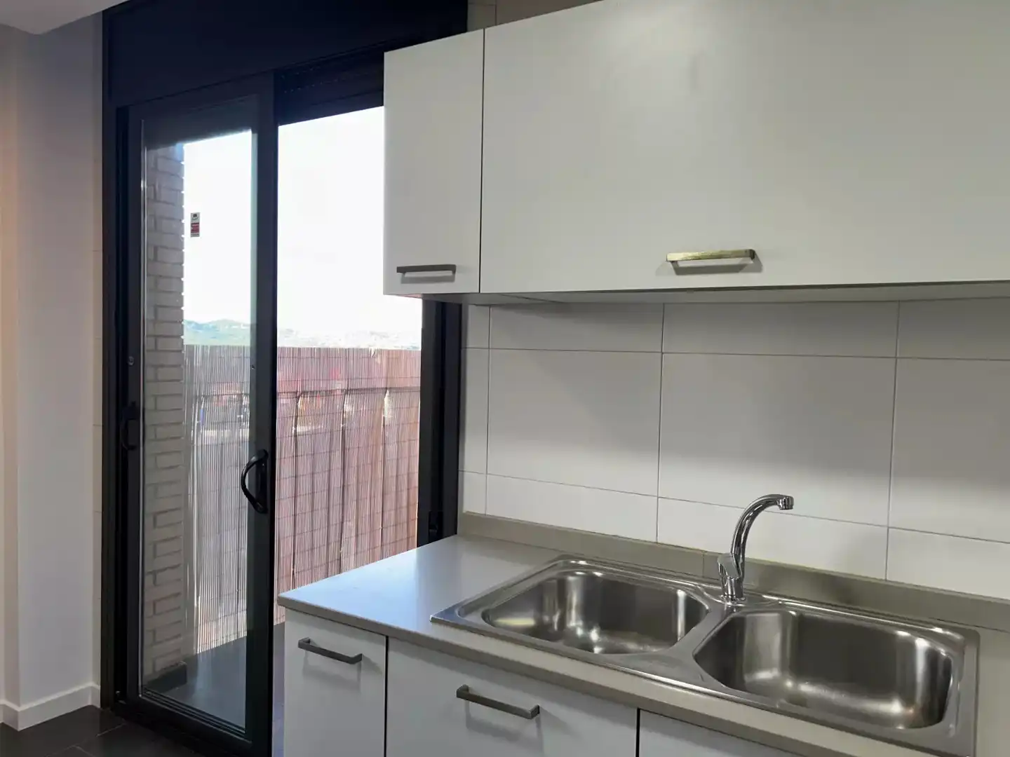 Kitchen of Flat for sale in Hostalric  with Parquet flooring, Terrace and Storage room