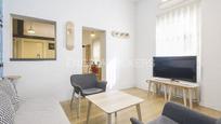 Sala d'estar de Apartament en venda en  Madrid Capital amb Aire condicionat i Calefacció